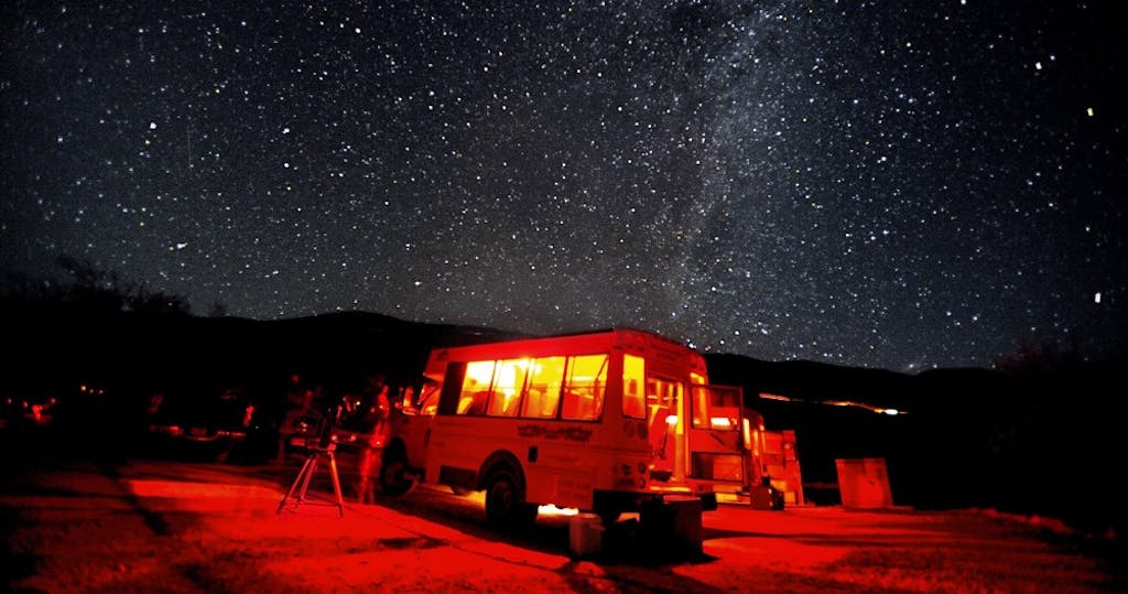 Hawaii Forest and Trail Tour Bus with Stars. Mauna Kea, Hawai'i. August 2010.